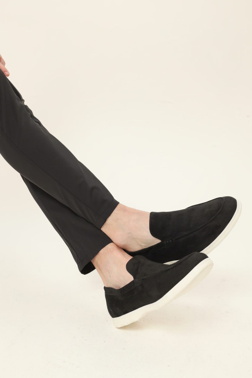 Black slip-on loafer close-up